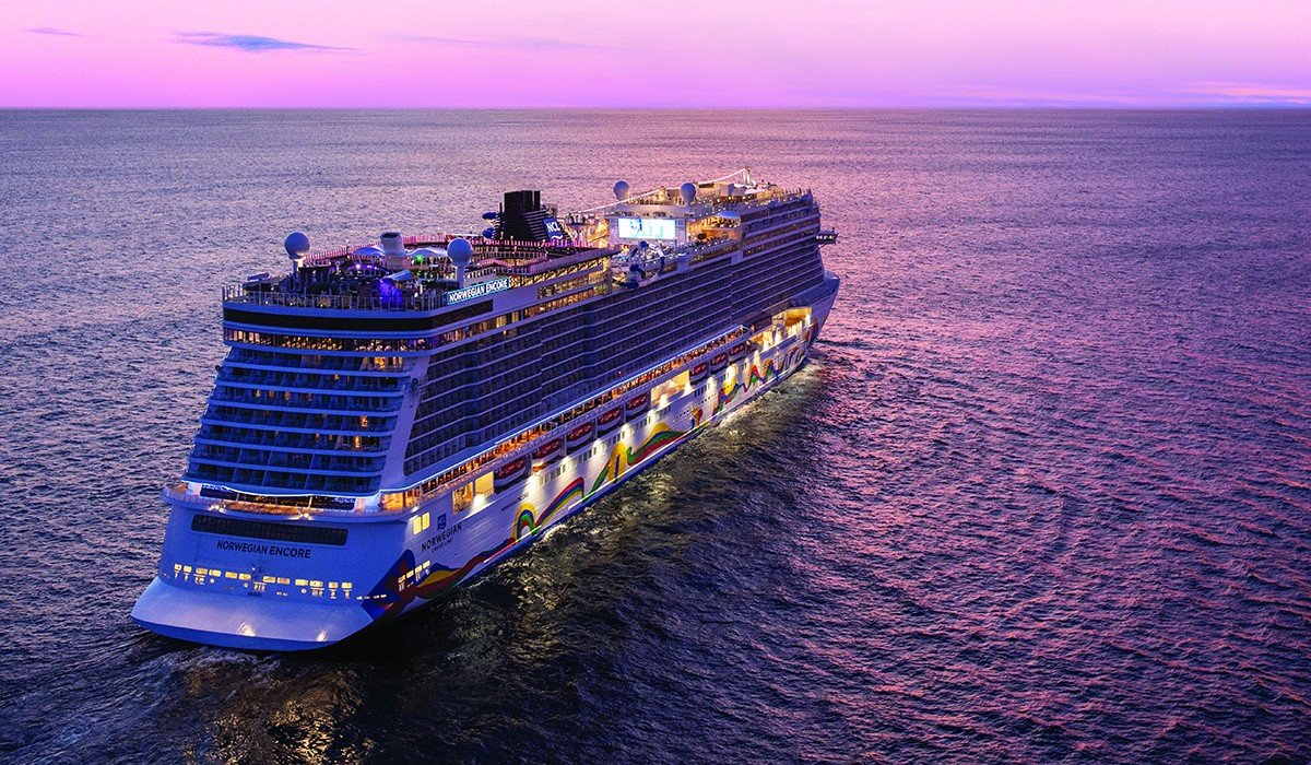 Cruise ship sailing at dusk