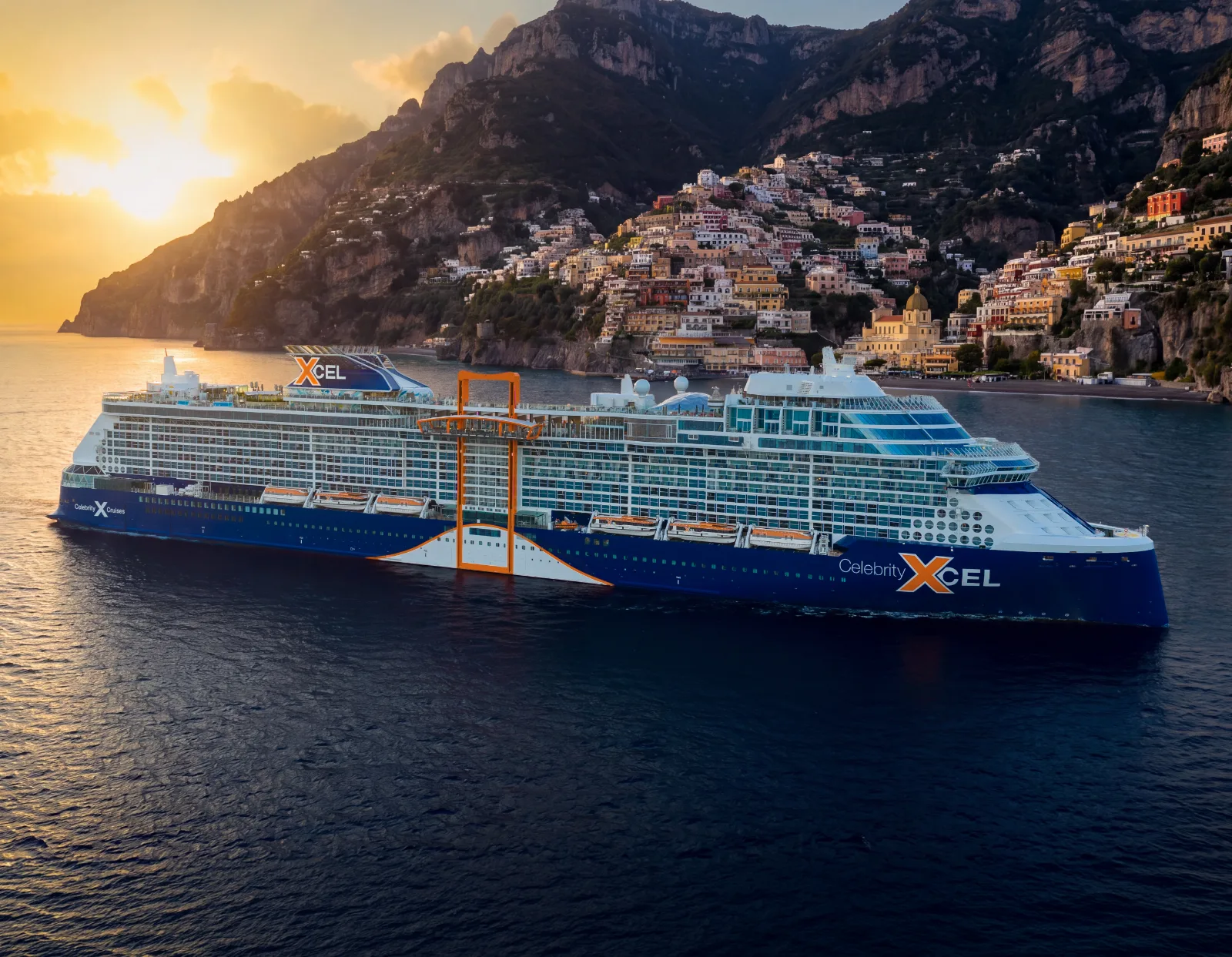 Cruise ship off the Amalfi Coast at sunset