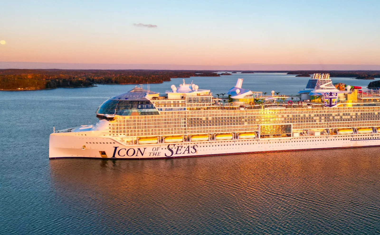 Large resort-style cruise ship at golden hour
